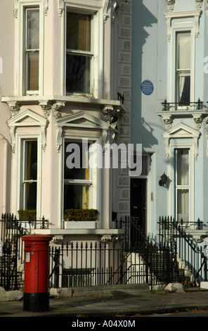 Victorian terraced houses and red pillar box on Cheyne Walk Chelsea London England Stock Photo