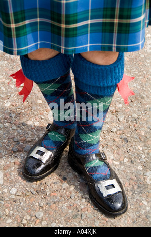 Closeup of colorful outfit of bag pipe player at the Loch Ness area near Drumnadrochit home of the Loch Ness Monster Nessie in t Stock Photo