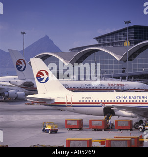 Aeroplanes at Chek Lap Kok Airport (now known as Hong Kong International Airport), Hong Kong, China. Stock Photo