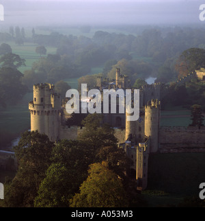 Misty autumn morning Warwick castle and River Avon UK aerial view Stock Photo