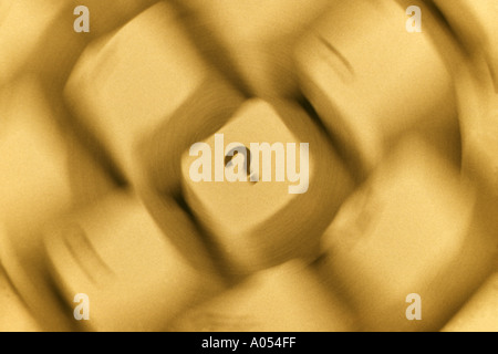Question Mark On Computer Keyboard Spinning Motion Blurred Sepia Toned Close up Stock Photo