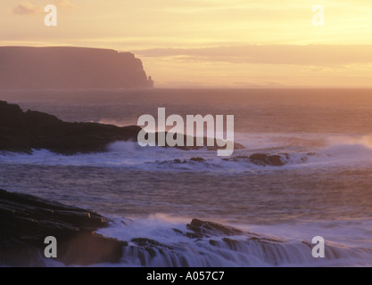 dh Qui Ayre YESNABY ORKNEY Stormy sea waves coastal rocks sunset Atlantic Ocean pink dusk seacoast seascape surf rough storm coast scotland littoral