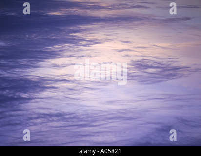 dh  CLOUDS BACKGROUND Thin black gray whispy cloud on blue yellow sky Orkney copyspace Stock Photo