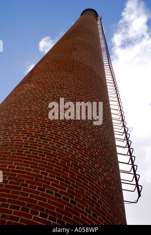 ladder on brick chimney stack. Mundaring Weir, Western Australia Stock Photo