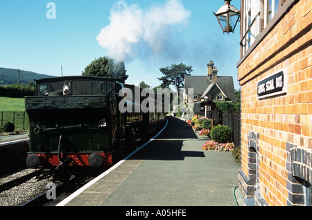 STEAM TRAIN DEPARTING CARROG STATION on 8 mile Llangollen Steam Railway Carrog Denbighshire North Wales UK Stock Photo