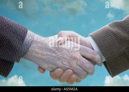 Computer generated image of a man hand shaking hands with a digital hand with clouds in the background Stock Photo