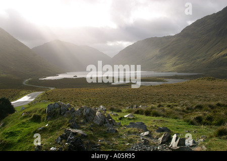 Ireland County Mayo Mweelrea Mountains rays of sunlight over Doo Lough Stock Photo