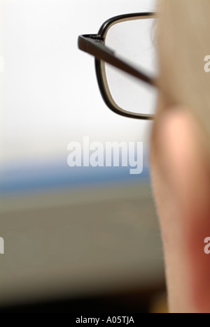 Woman Looking at a Computer Screen, Close Up. Stock Photo