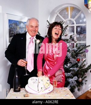 Wedding celebration cutting the cake Stock Photo