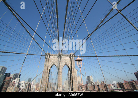 Spanning the East River from Brooklyn to Manhattan, the Brooklyn Bridge, New York Stock Photo