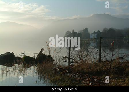 Morning Mist on Ullswater Towards Helvellyn from Watermillock Cumbria England United Kingdom UK Stock Photo