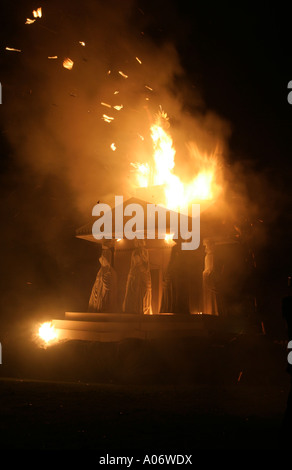 The goddess Vesta takes fire made by local sculptor Lisa De Larny atop the Hexham Bonfire for Nov 4 display 2006 Stock Photo