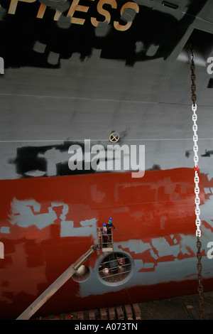 graphic detail shot of ship repair and ship painting and protective coating being applied at Hong Kong United Dockyard HUD Stock Photo