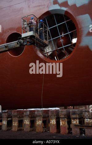 graphic detail shot of ship repair and ship painting and protective coating being applied at Hong Kong United Dockyard HUD Stock Photo