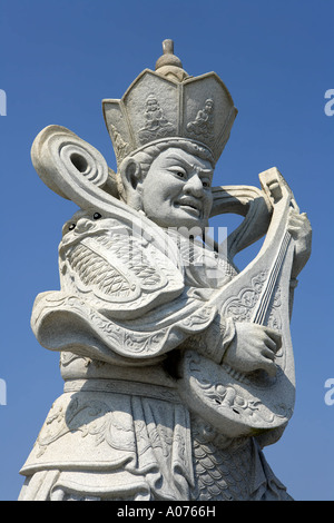 Musician Statue at Zizhulin, Putuoshan, China. Stock Photo
