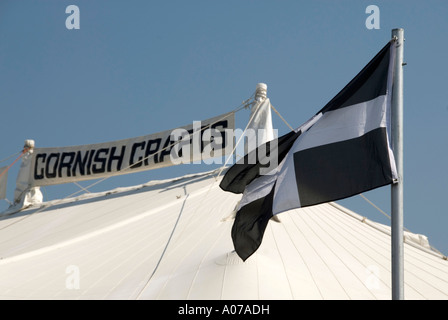 Flag of St Piran patron saint of miners above Cornish Crafts marquee Royal Cornwall County Agriculture Show & Country Fair Wadebridge Cornwall England Stock Photo