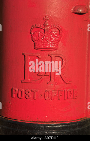 Traditional British Post Box in Rural Village Stock Photo