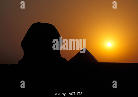The Sphinx and Pyramids of Giza at Sunset, Egypt Stock Photo