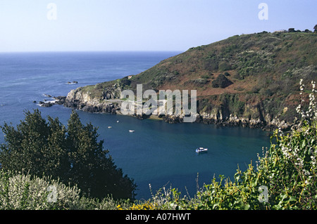 VIEW ACROSS SAINTS BAY FROM COASTAL FOOTPATH GUERNSEY CHANNEL ISLANDS Stock Photo