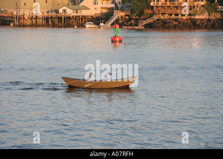 Girls Rowing Dory Stock Photo