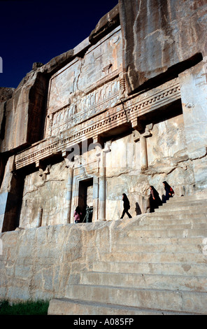 The tomb of Artaxerxes III, carved into a cliffside above the ancient ruins of Persepolis. Stock Photo