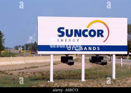 Suncor Energy Oil Sands Company Sign at Athabasca Tar Sands Production Site, near Fort McMurray, Alberta, Canada Stock Photo