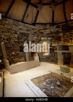 dh Replica SKARA BRAE ORKNEY Box bed and fireplace inside replica of prehistoric house neolithic hearth bronze age reconstruction furniture britain Stock Photo