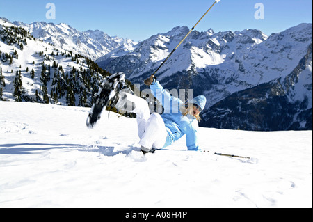 Frau im Winter beim Wandern mit Schneeschuhen, woman in winter hiking with snow shoes Stock Photo