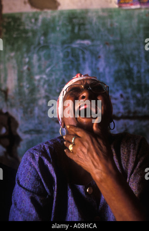 Toothless elderly black woman laughes Afro brazilian woman slave descendent in Sertão back country Brazil Stock Photo