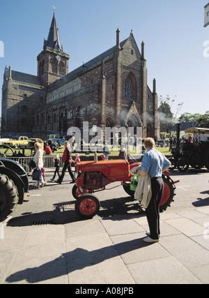 dh Broad Street KIRKWALL ORKNEY Scotland Tractor at vintage car rally people St Magnus Cathedral tractors uk Stock Photo