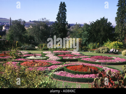 dh Rodney gardens PERTH PERTHSHIRE Flower garden and people sitting on park bench parkland floral scotland uk flowers Stock Photo