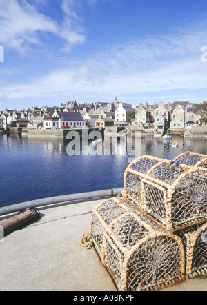 dh Stromness Harbour STROMNESS ORKNEY Lobster creels waterfront quayside harbour houses town pots cages fishing harbor scotland coastal summer Stock Photo