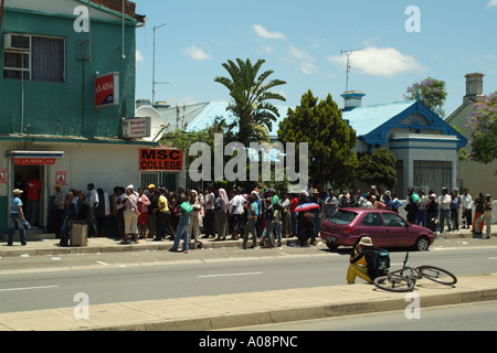 queue of customers at cash machine King Williams Town Eastern Cape South Africa RSA Stock Photo