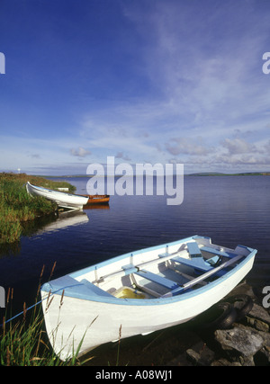 dh Loch of Harray STENNESS ORKNEY Fishermans rowing boat tied up at side of  loch angling Stock Photo
