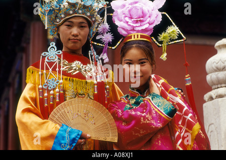 China, Girls In Ching Dynasty Costumes Stock Photo