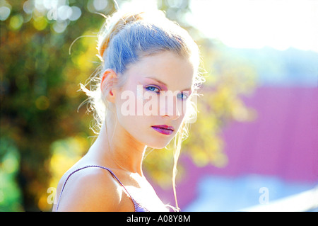 Side profile of a young woman wearing make up Stock Photo