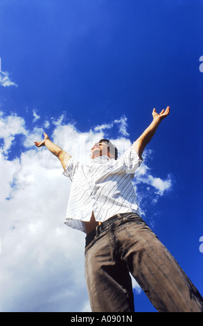 Young man jumping up in the air Stock Photo
