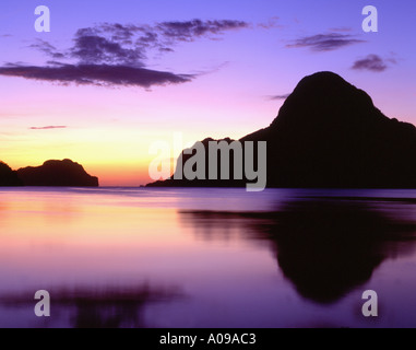 A dusk view of Cadlao Island in Bacuit Bay, seen from El Nido town Palawan Philippines Stock Photo