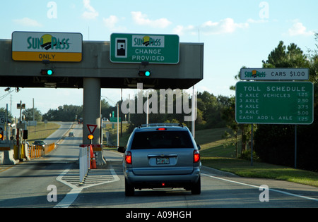 Florida Turnpike highway toll booths with SunPass lanes during the ...