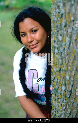 Woman age 35 visiting from Niger Africa enjoying vacation in the north woods. Clitherall Minnesota USA Stock Photo