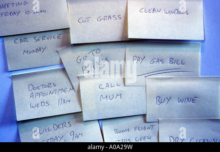 Multiple to-do notes stuck to a door / wall Stock Photo