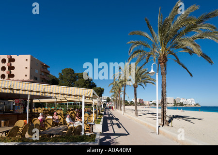 Seafront restaurant, promenade and beach in the winter season, Magaluf, Bay of Palma, Mallorca, Balearic Islands, Spain Stock Photo