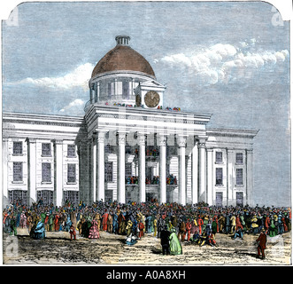 Jefferson Davis inaugurated as president of the Confederate States of America in the Montgomery Alabama state house in1861. Hand-colored woodcut Stock Photo