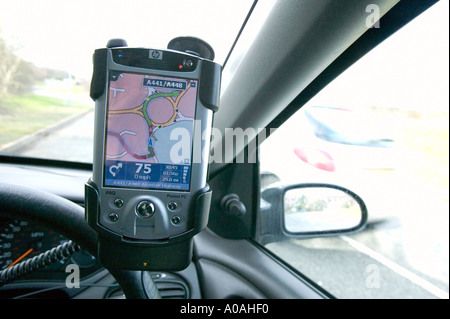 A Pocket PC GPS system mounted in a car Stock Photo