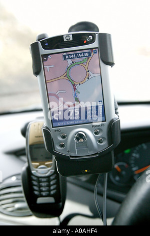 A Pocket PC GPS system mounted in a car Stock Photo