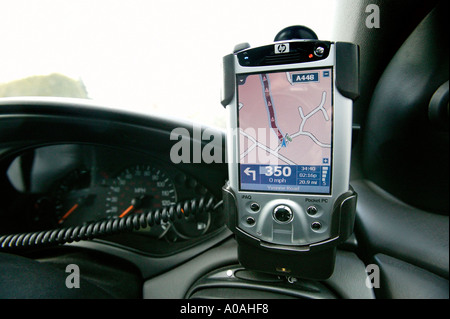 A Pocket PC GPS system mounted in a car Stock Photo