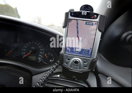 A Pocket PC GPS system mounted in a car Stock Photo