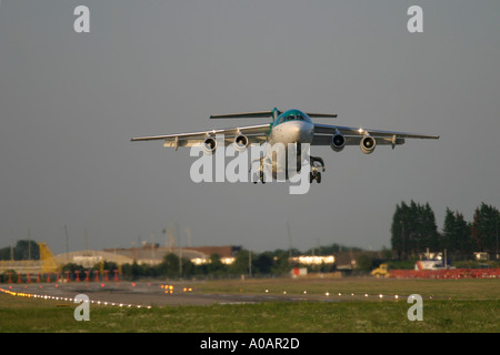 Aer Lingus British Aerospace BAe 146 taking off at London City Airport UK Stock Photo