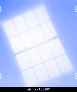 Window light shining on wall Stock Photo