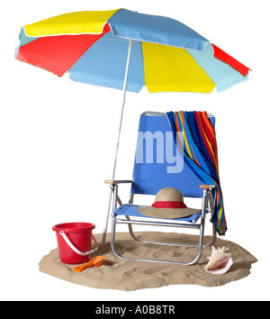 Blue Beach Chair with Umbrella towel hat shell bucket and shovel Stock Photo